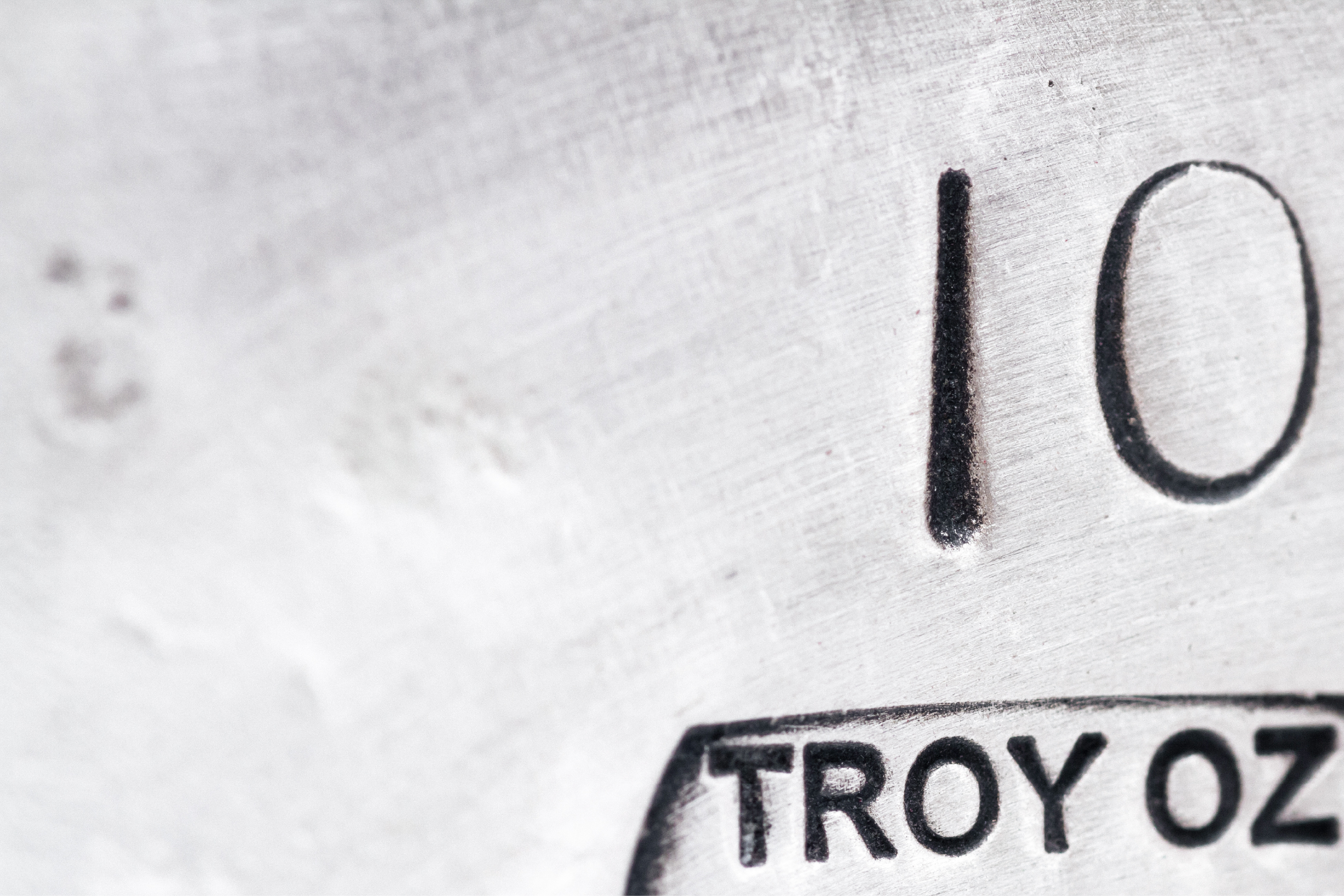A bar stamped with its weight in troy ounces