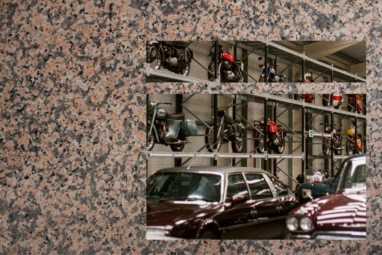 Tiered storage racks holding an automobile kept off-site.