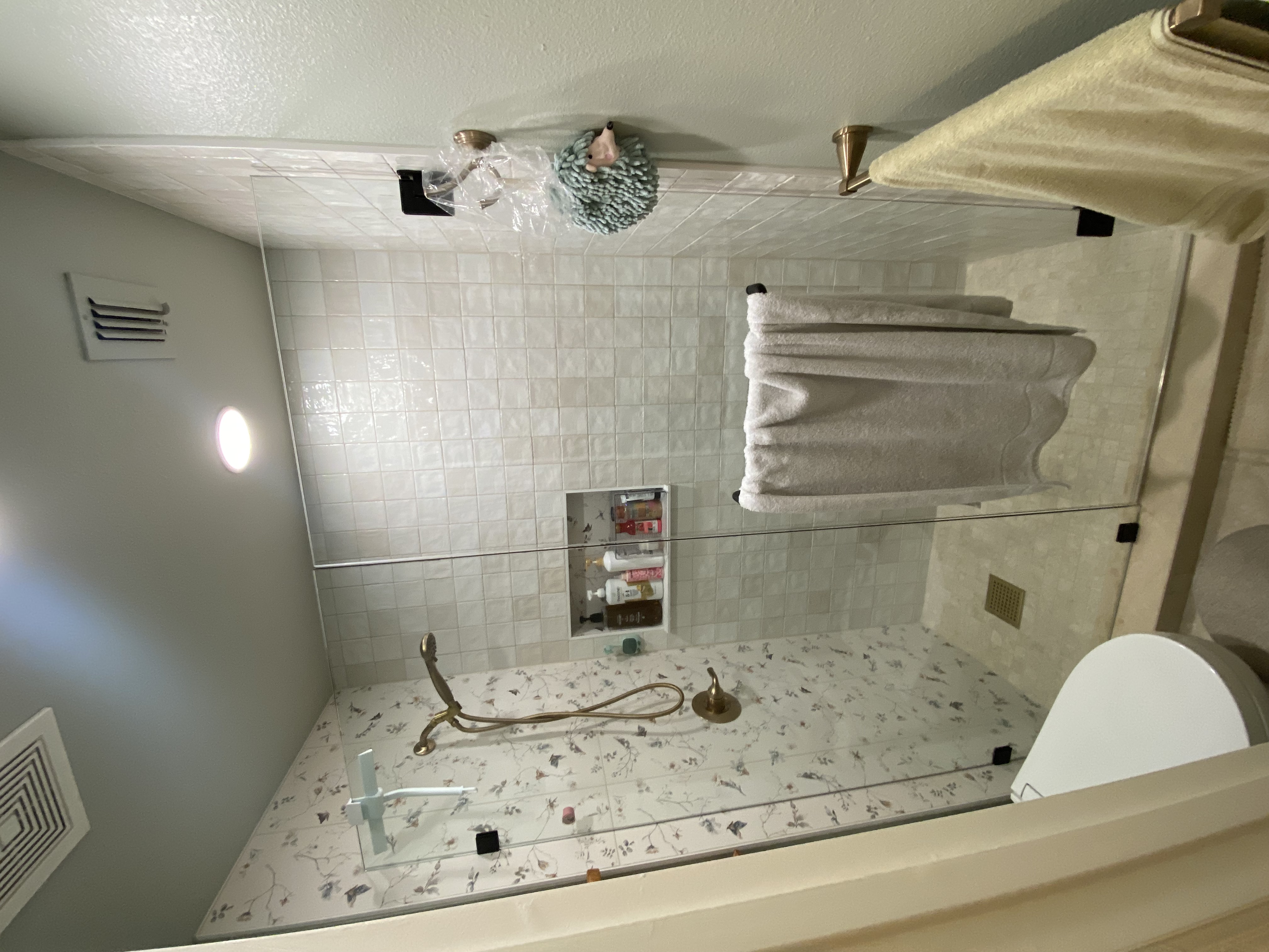 Completed Flower Mound bathroom remodel with tub-to-walk-in-shower conversion, new vanity and lighted mirror by Redcrest Construction