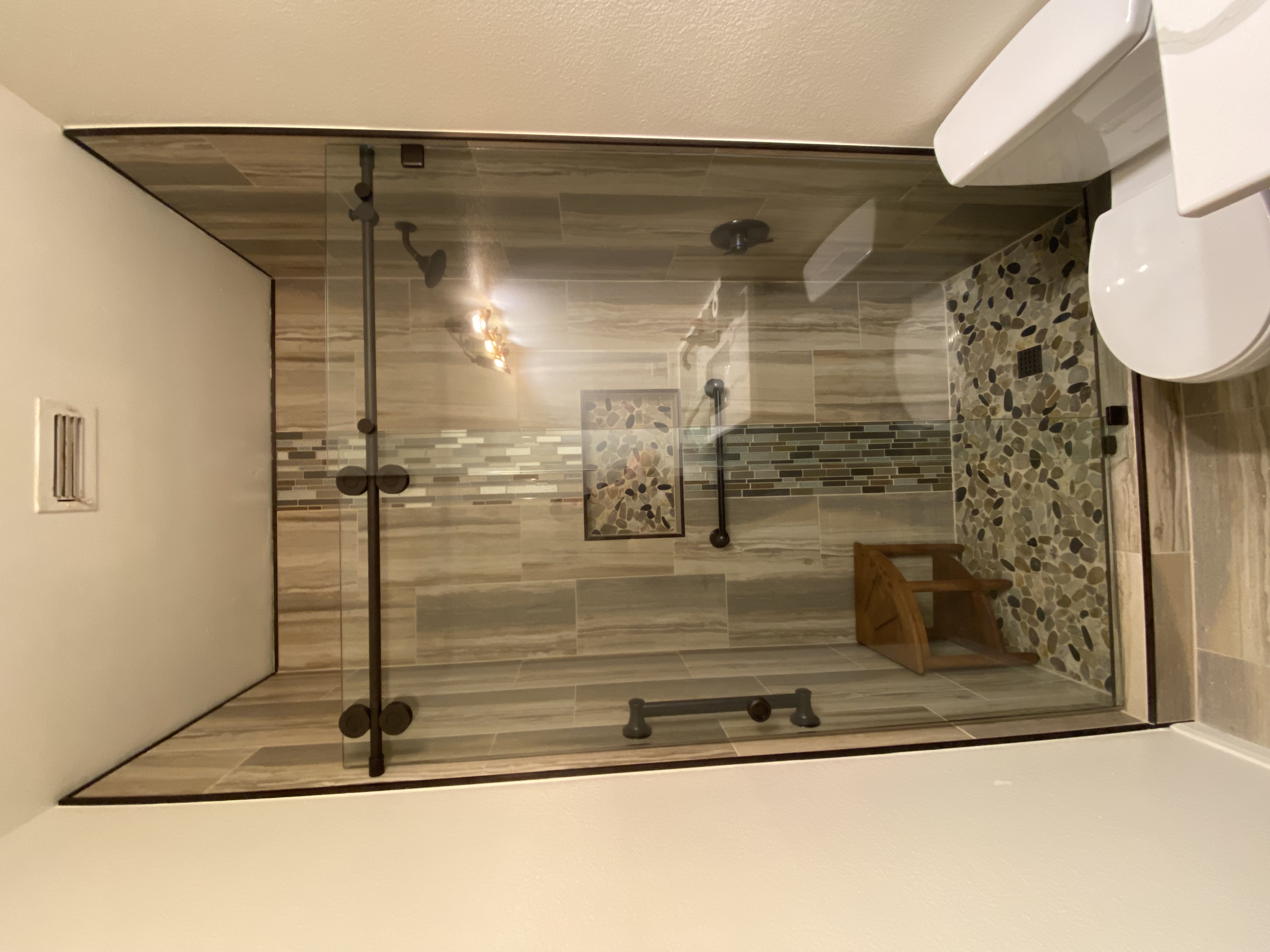 Completed custom shower remodel in Lewisville, Texas by Redcrest Construction