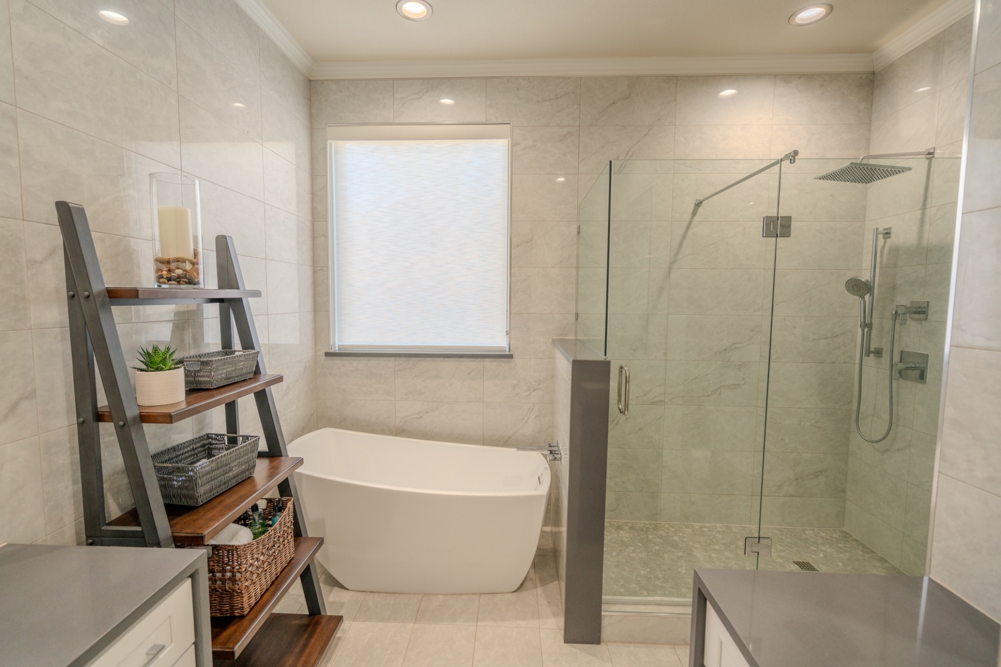 Completed Colleyville bathroom remodel with freestanding tub and frameless walk-in shower by Redcrest Construction