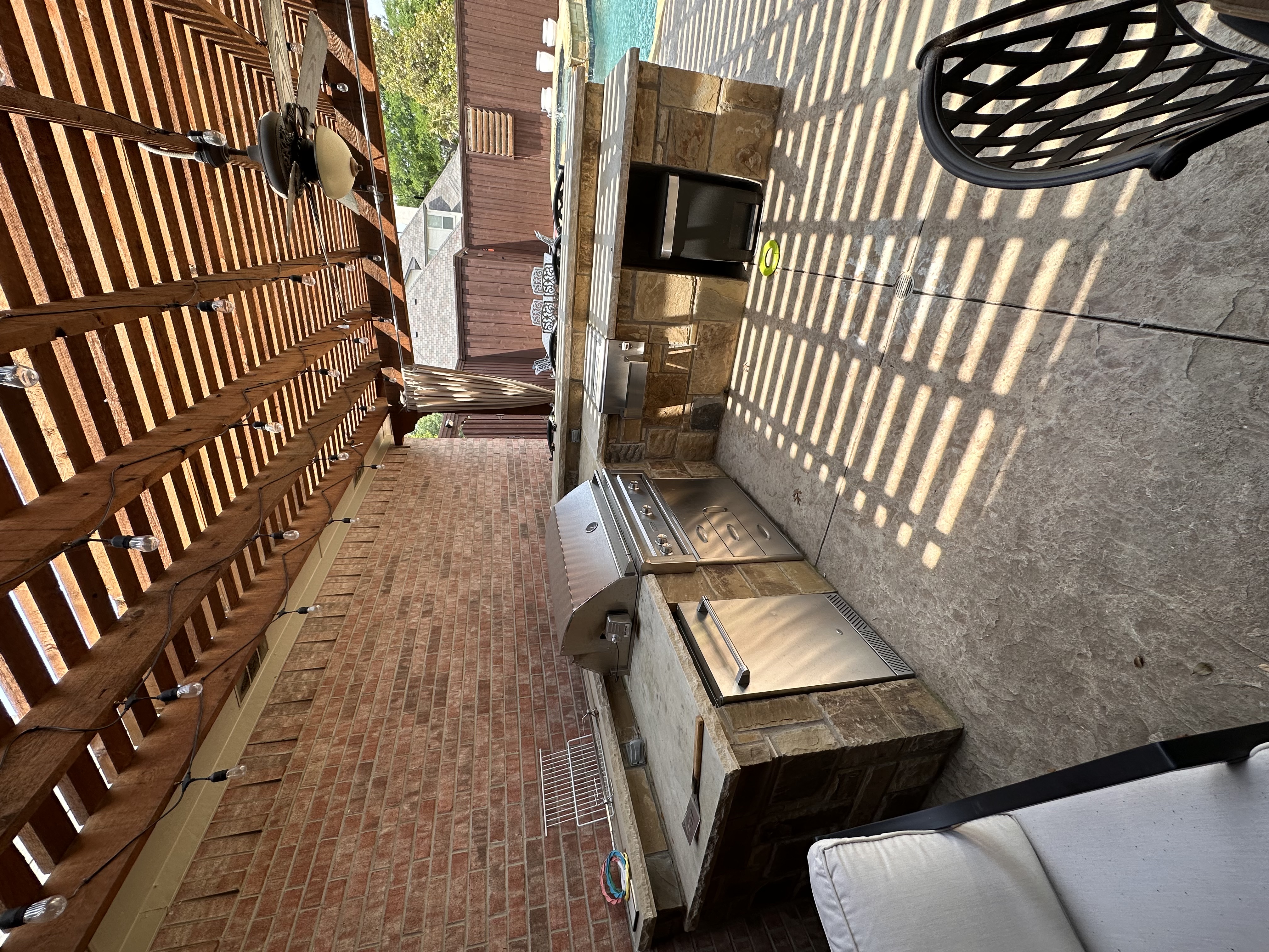 Coppell outdoor kitchen with new granite countertops installed by Redcrest Construction