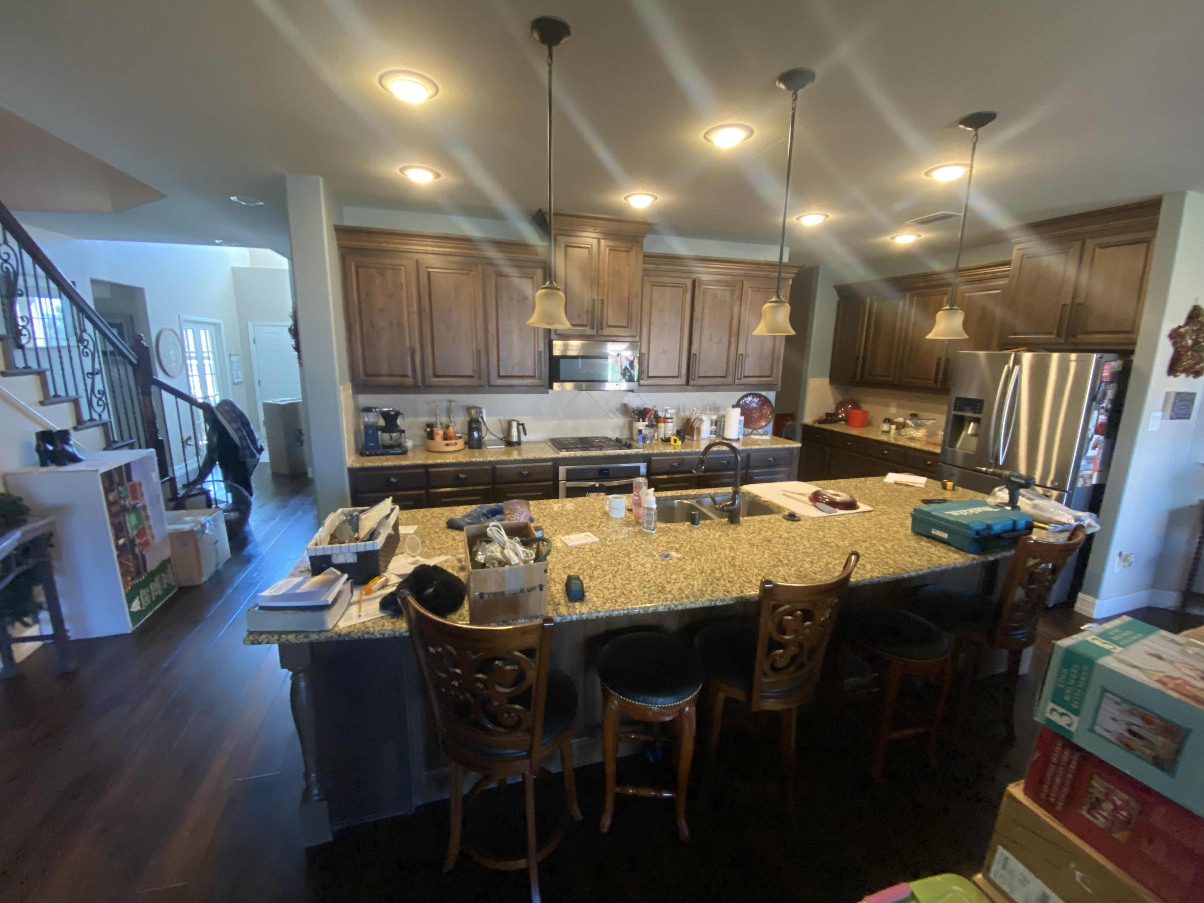 Updated Fort Worth kitchen with new quartz countertops and marble tile backsplash by Redcrest Construction