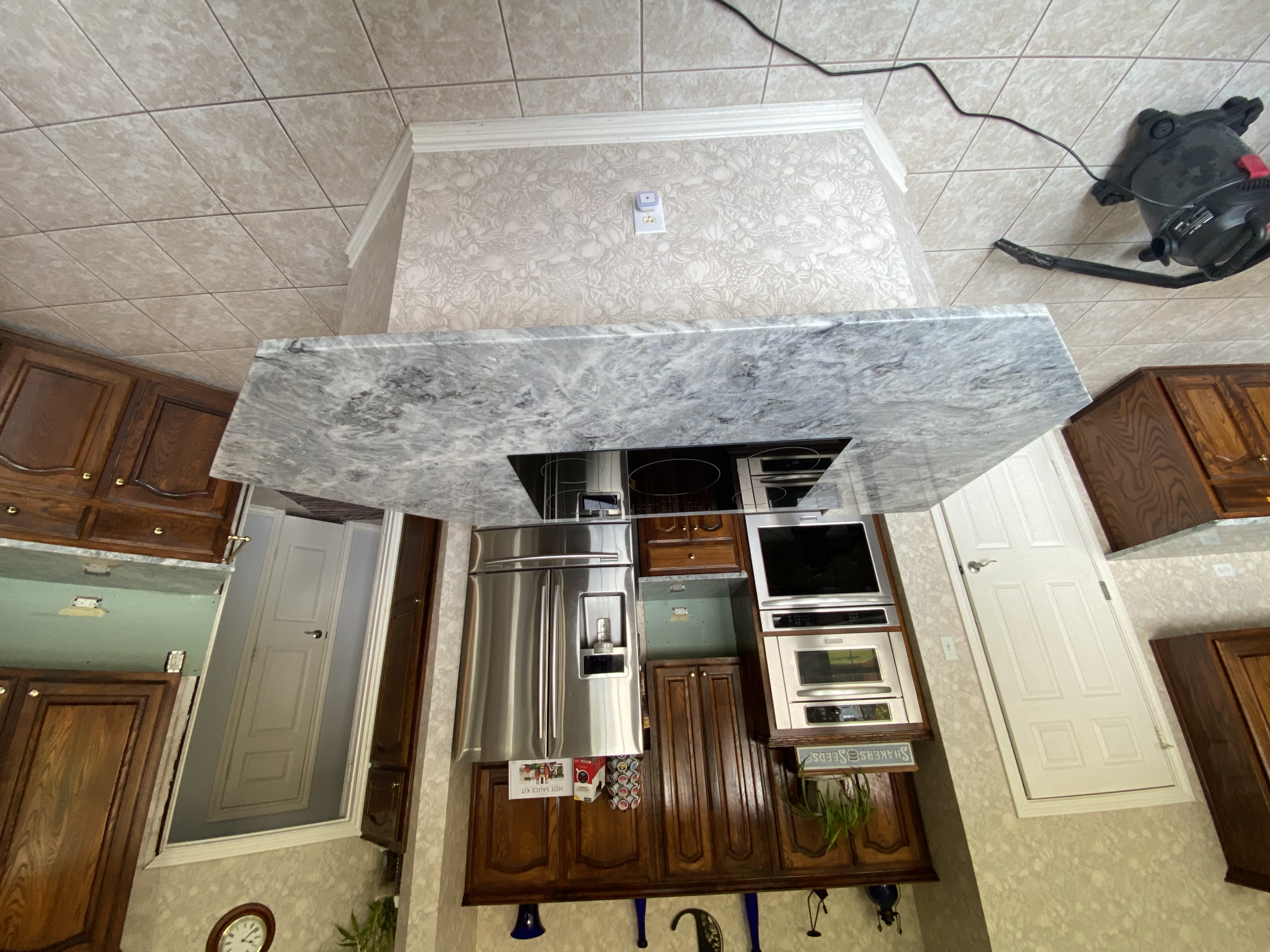 Corinth Texas kitchen with new granite countertops installed by Redcrest Construction