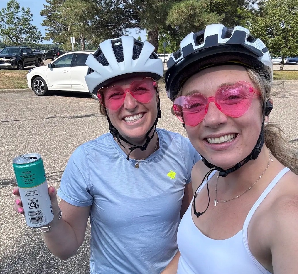 Two girlies in pink heart sunglasses smiling after the first ride