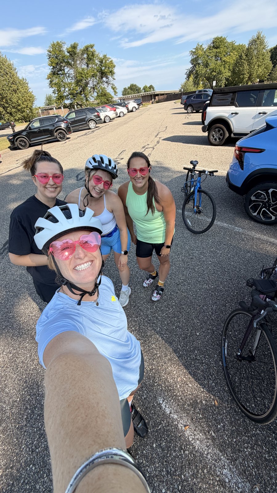 Three girlies in pink heart sunglasses at the first ride
