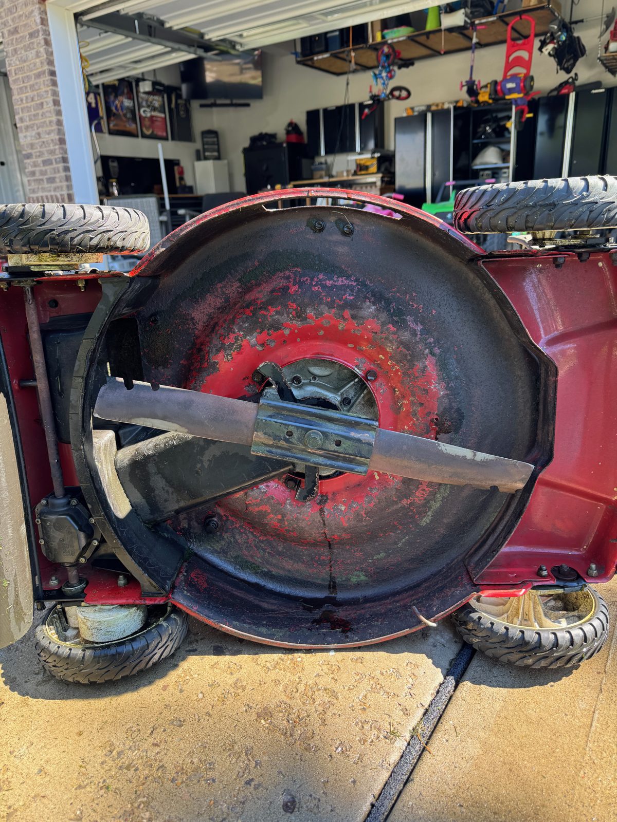 Walking mower deck cleaned out after the tune-up
