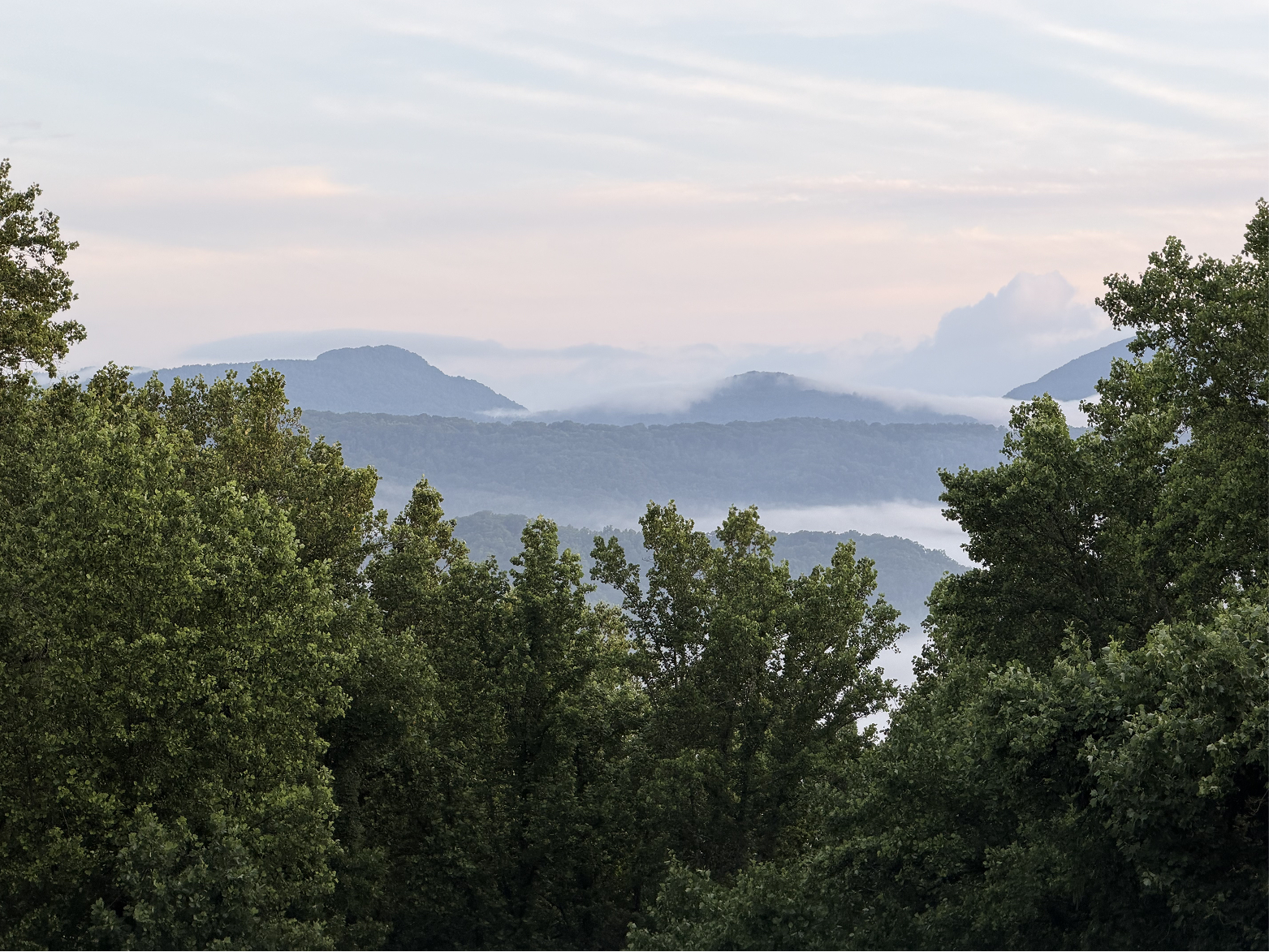 Beautiful mountain scene with misty mountains.