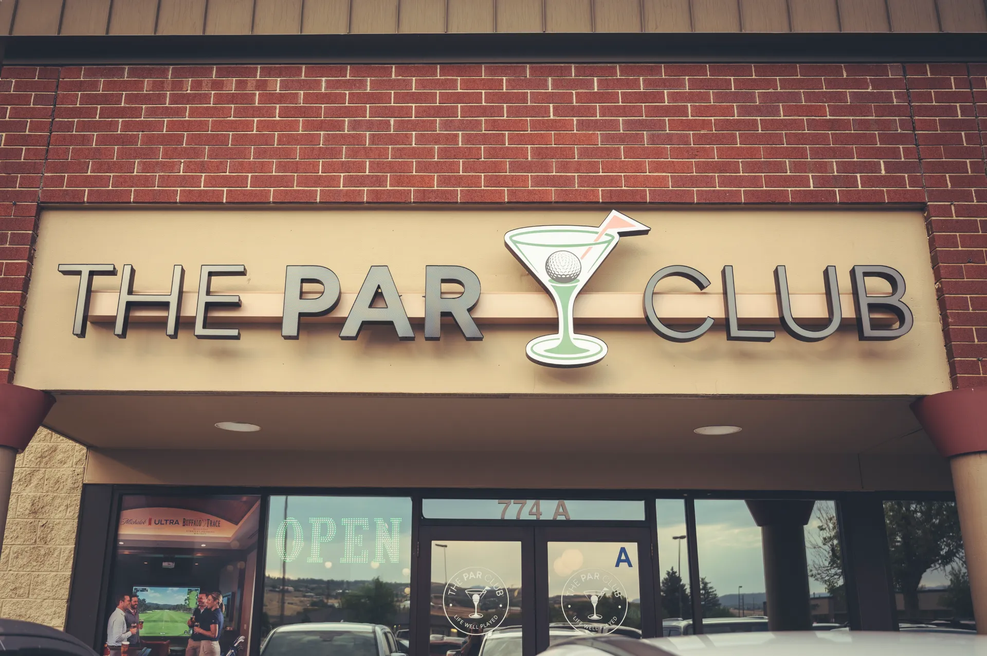 The PAR Club storefront sign and entrance