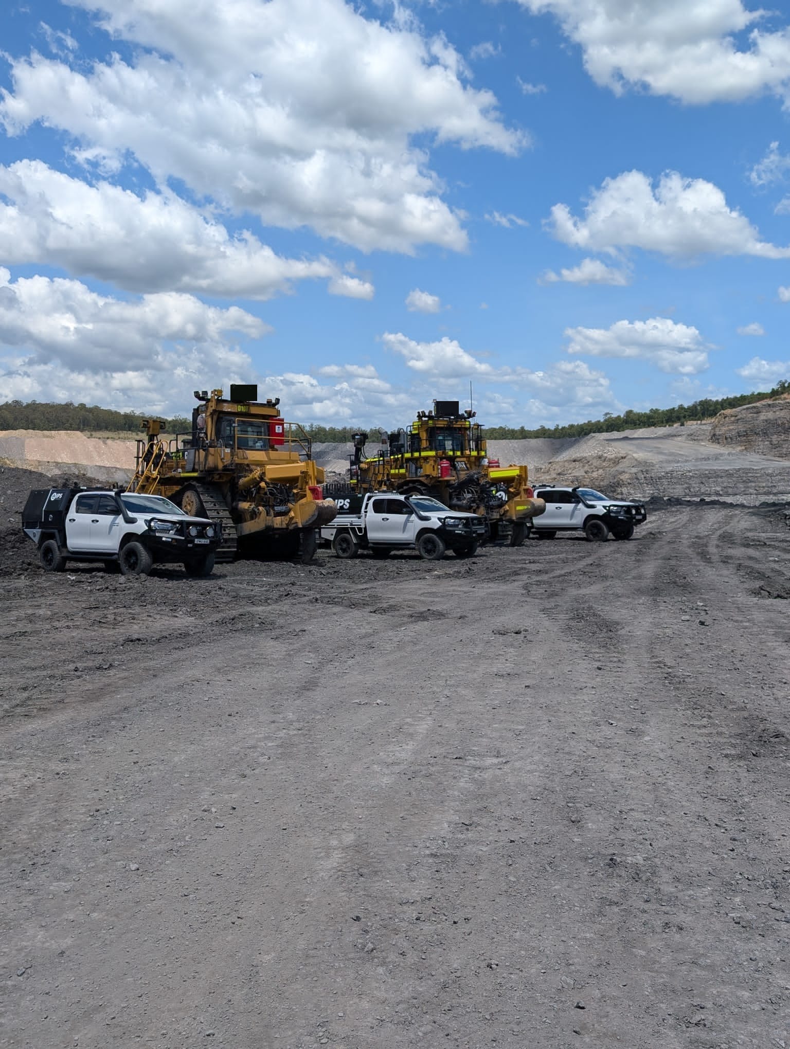 In Pit Solutions fleet with bulldozers in an open-cut mine