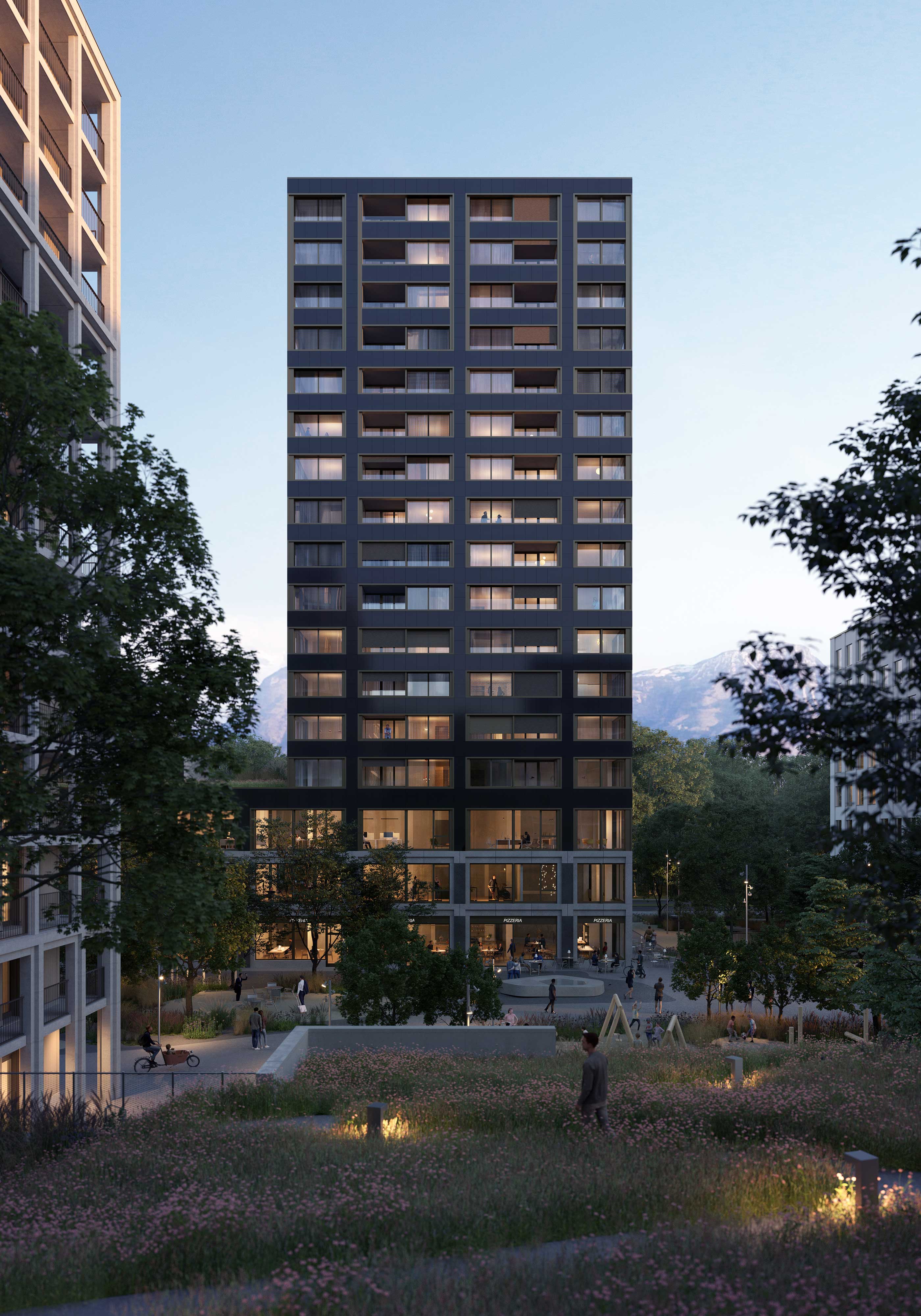 Modern multi-story residential building with dark facade and balconies, illuminated interior lights, surrounded by greenery and people walking in an outdoor plaza at dusk with mountains in the background.