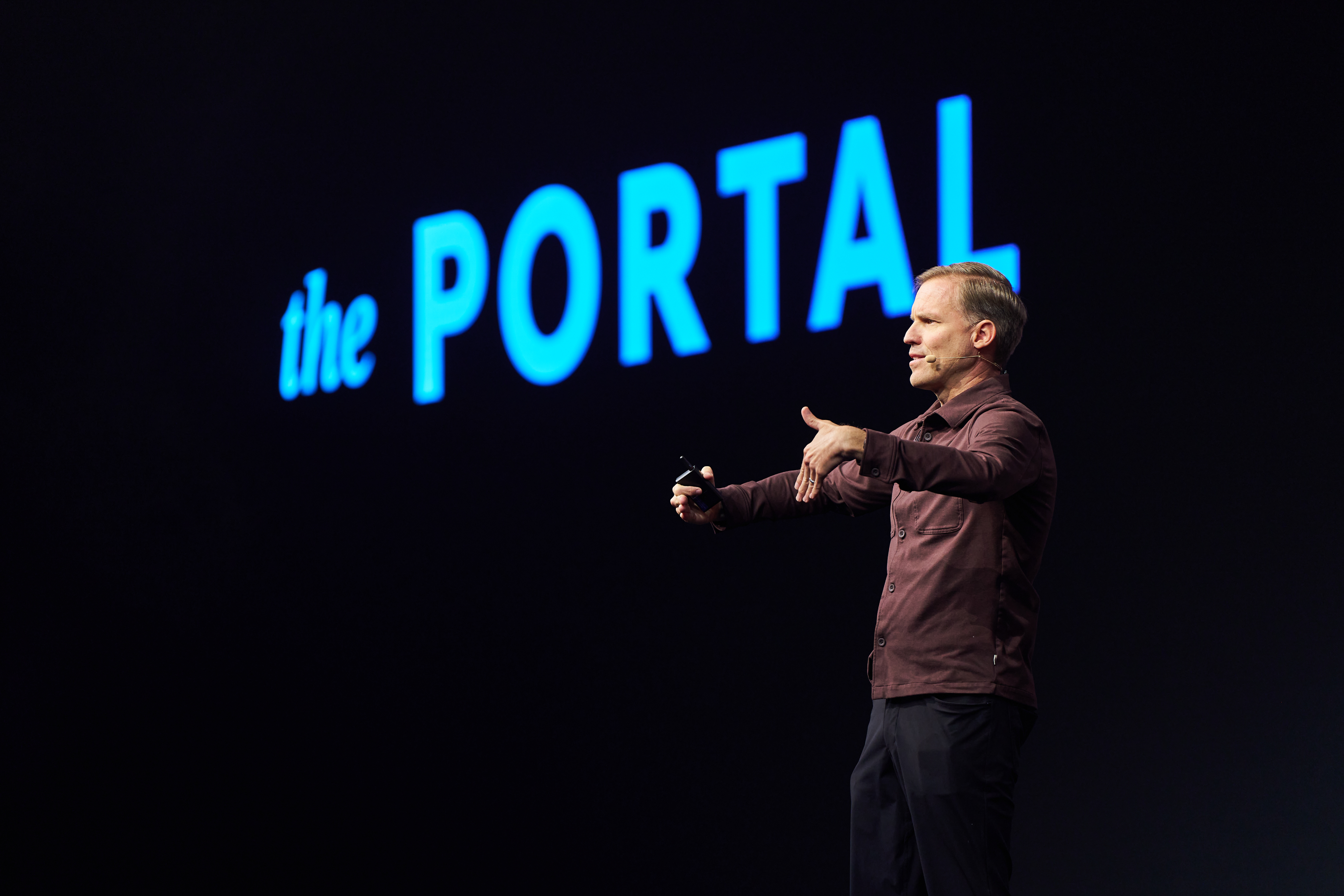 Speaker on stage at an Accelerate conference