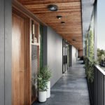 Image of common walk way and entrance to apartments
