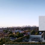 Panoramic image of rooftop views, including city skyline, from The International