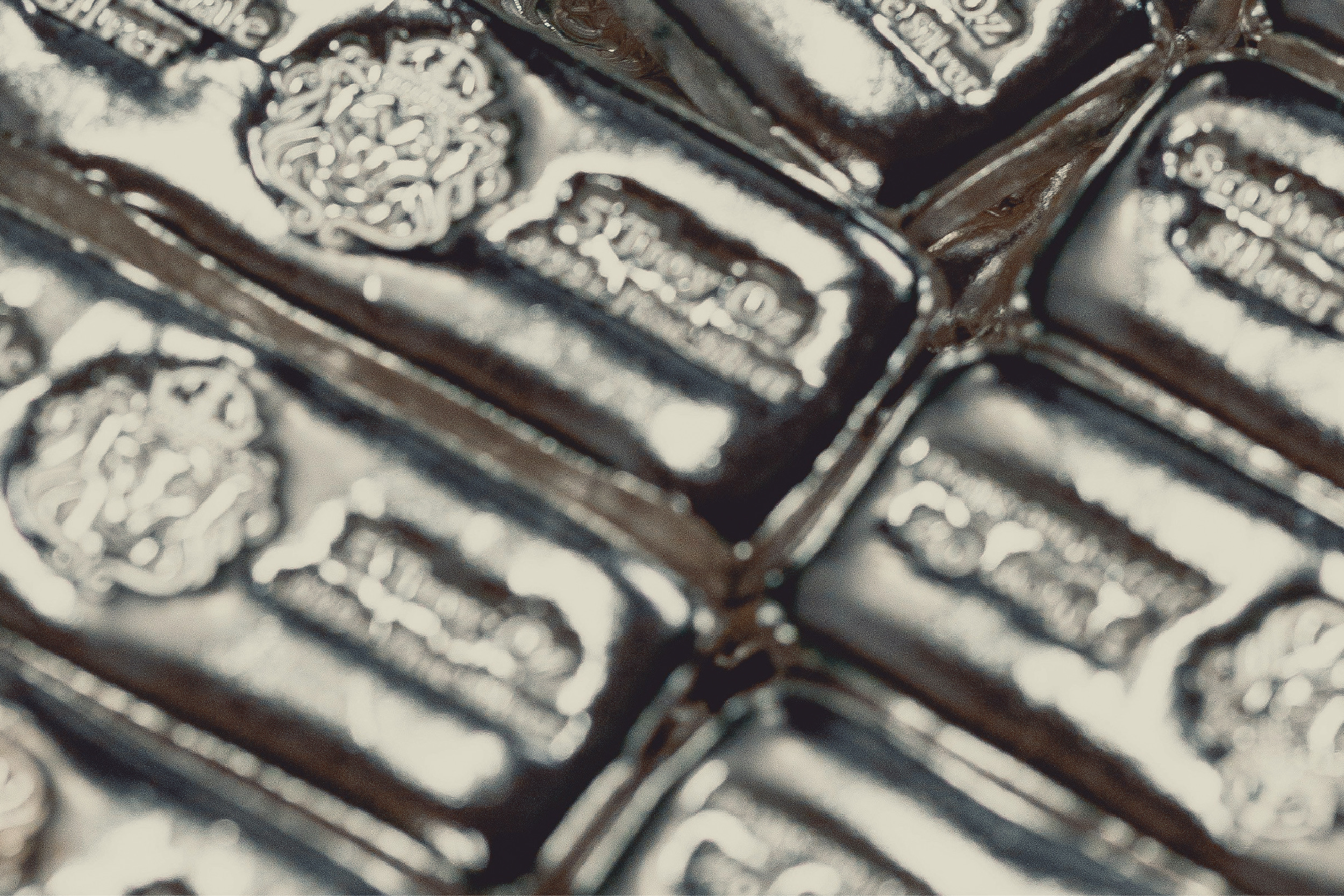 Grid of stamped metal bars.
