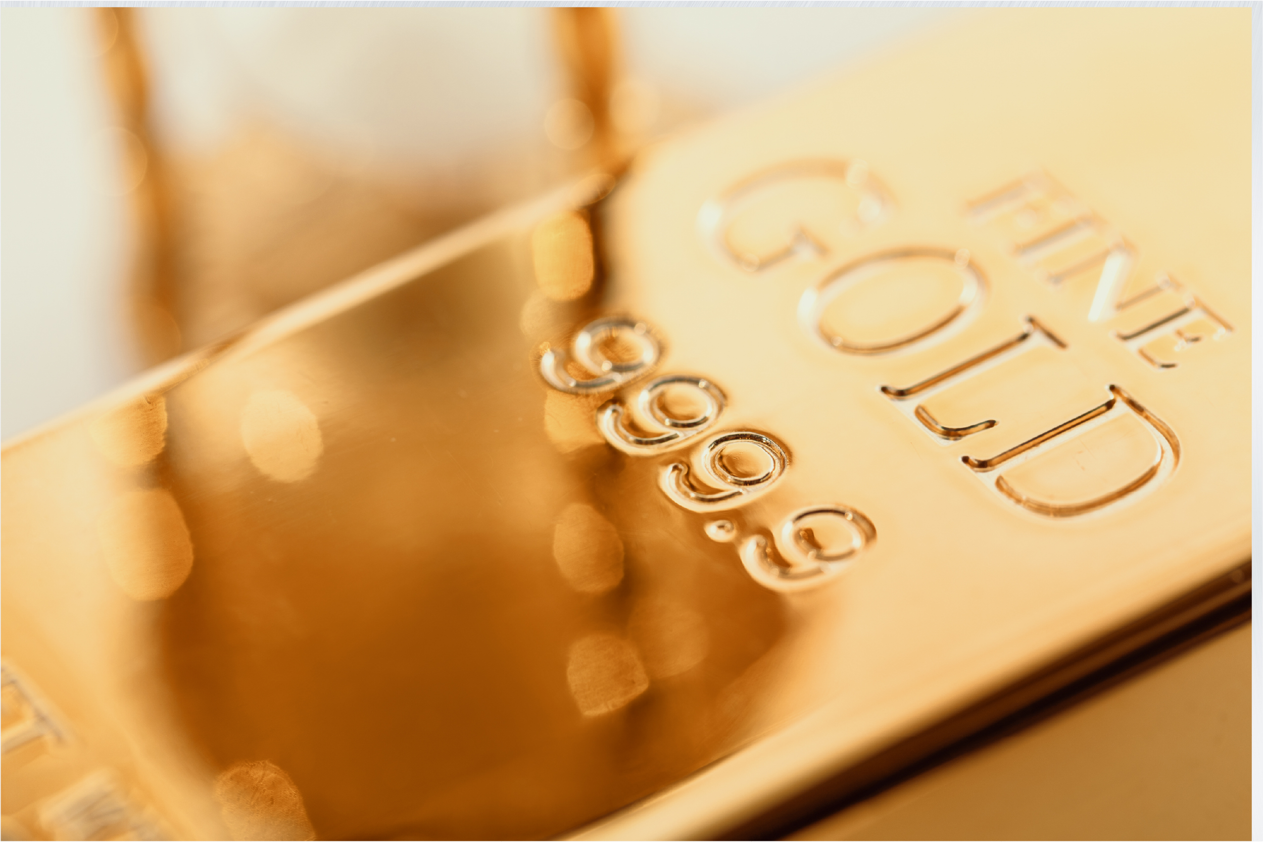 Gold bar stamped with its fineness marking.