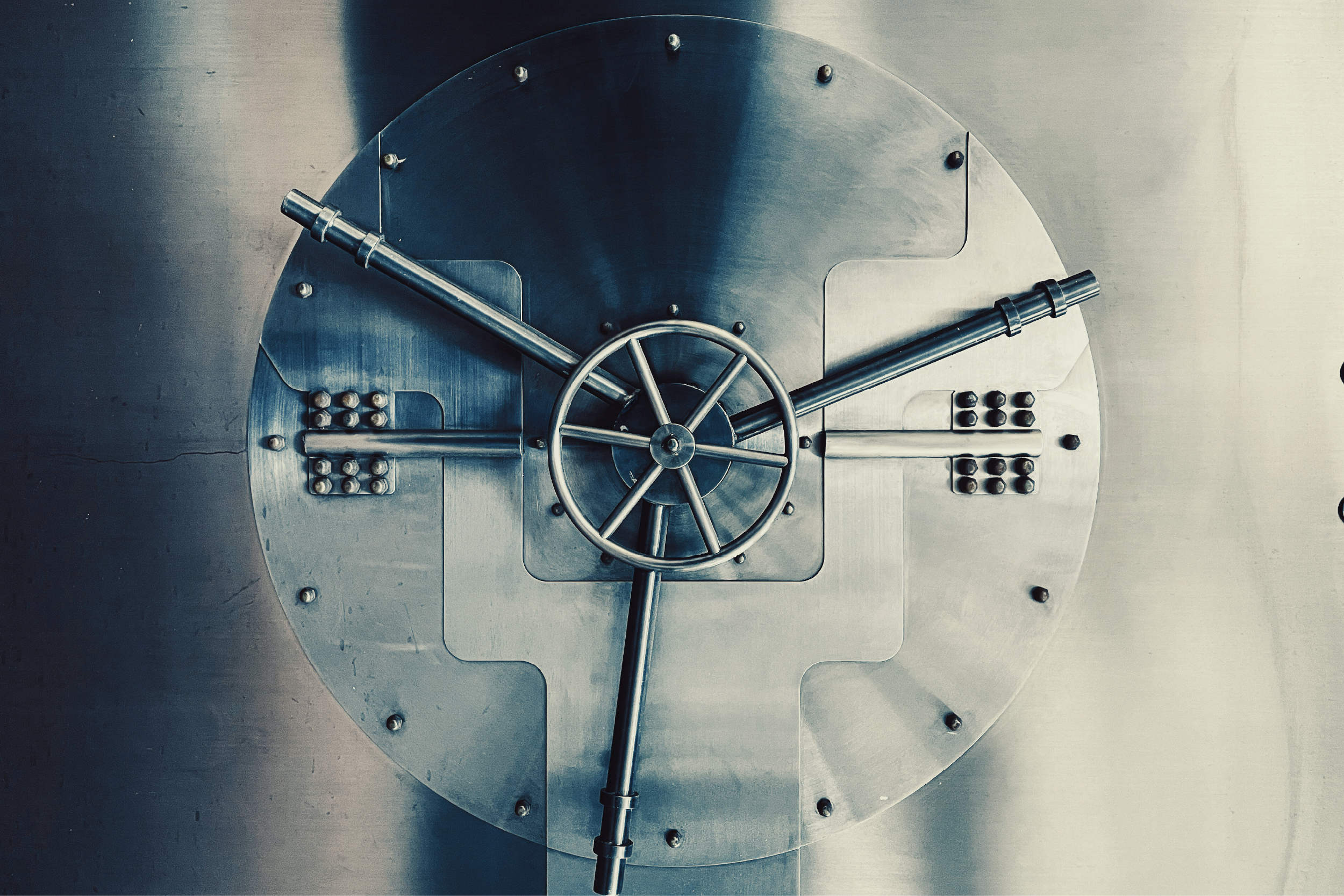 Locking mechanism inside an open vault door.