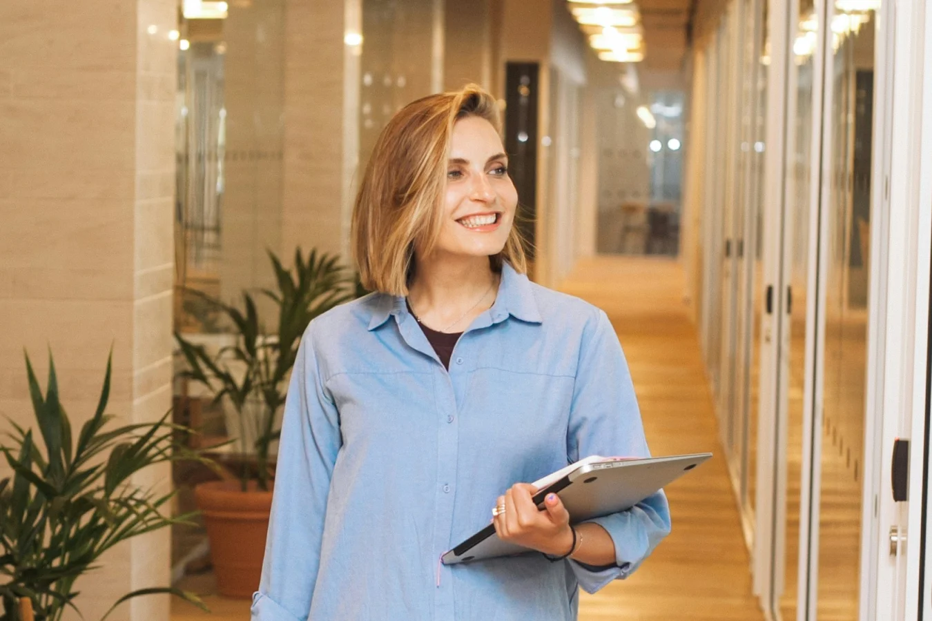 Woman using a tablet in a modern office