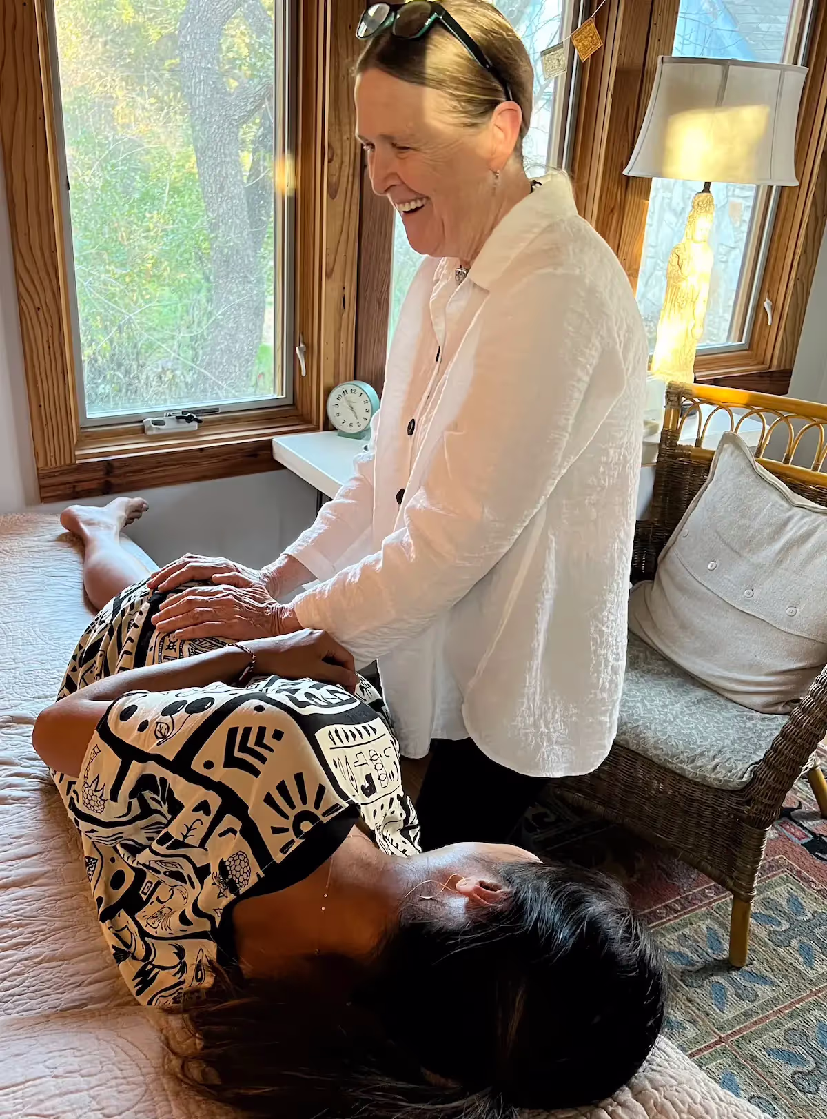 Cheryl Sew Hoy and her midwife doing a Spinning Babies positioning technique.