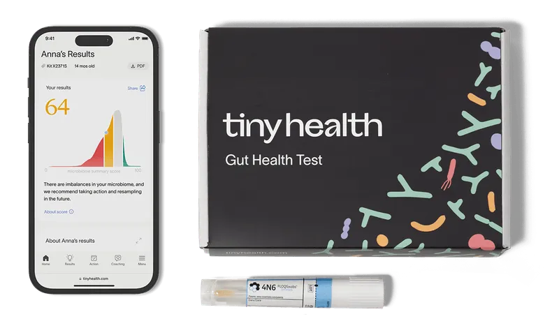 The contents of a Baby Gut Health Test from Tiny Health including a swab for samples and prepaid mailers.