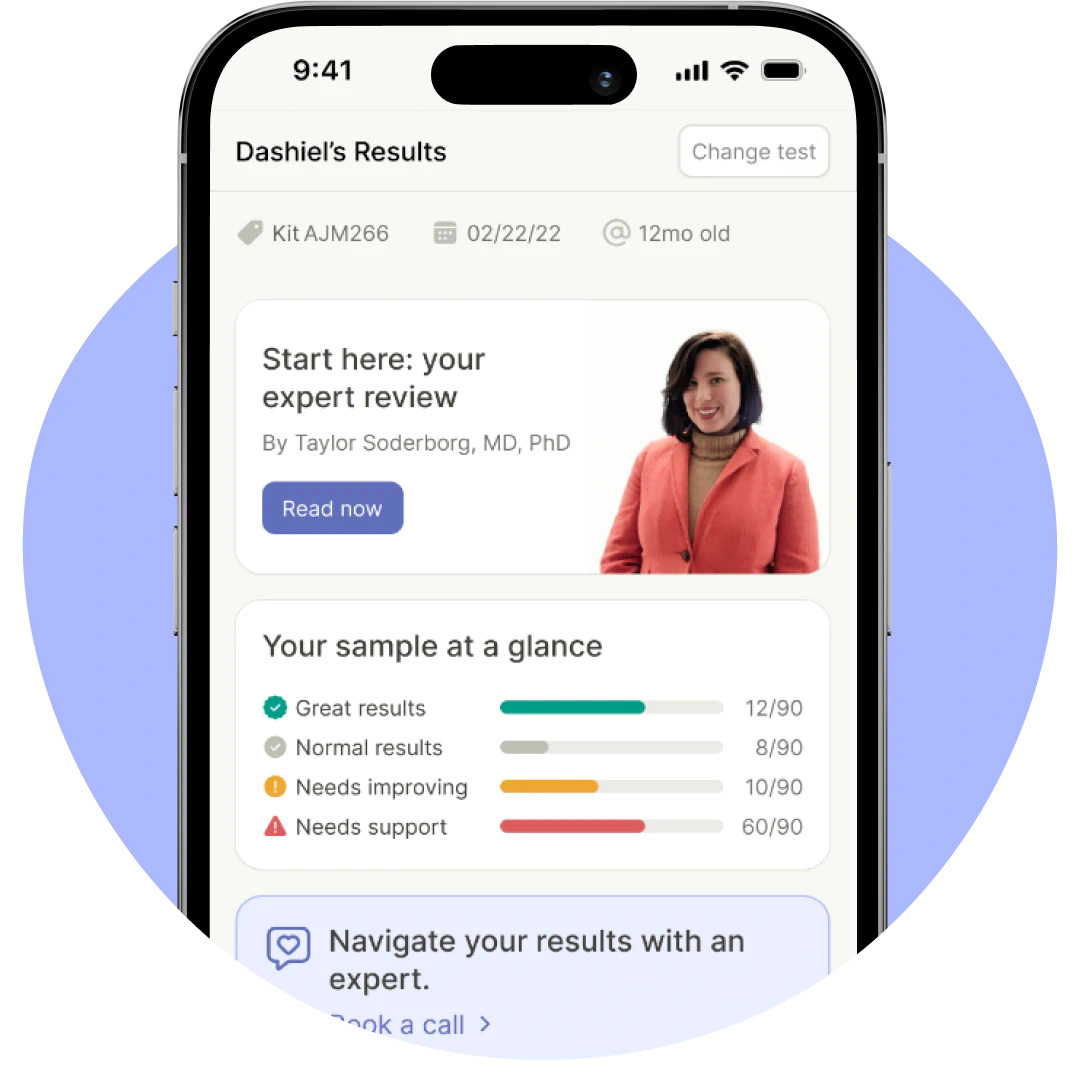A woman's phone is displaying the dahlia results on Tiny health  app.