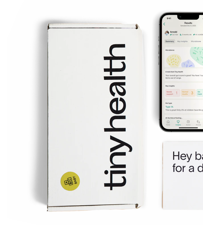 A Tiny Health box, a mobile phone and part of an envelope for a gut testing application