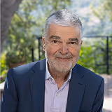 A headshot of Dr. Emeran Mayer, MD, a Tiny Health advisor