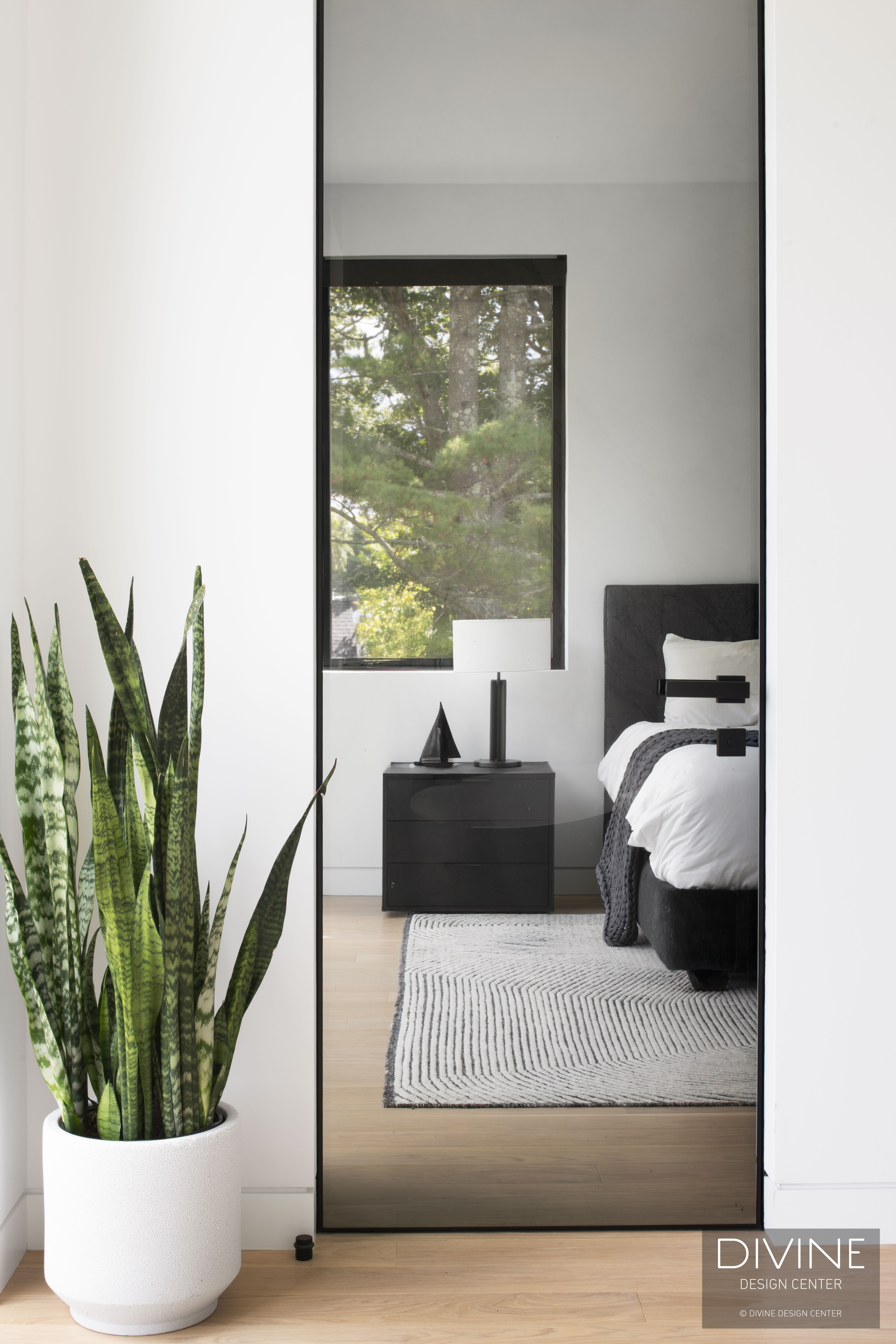 Hallway with contemporary art, refined minimalist design