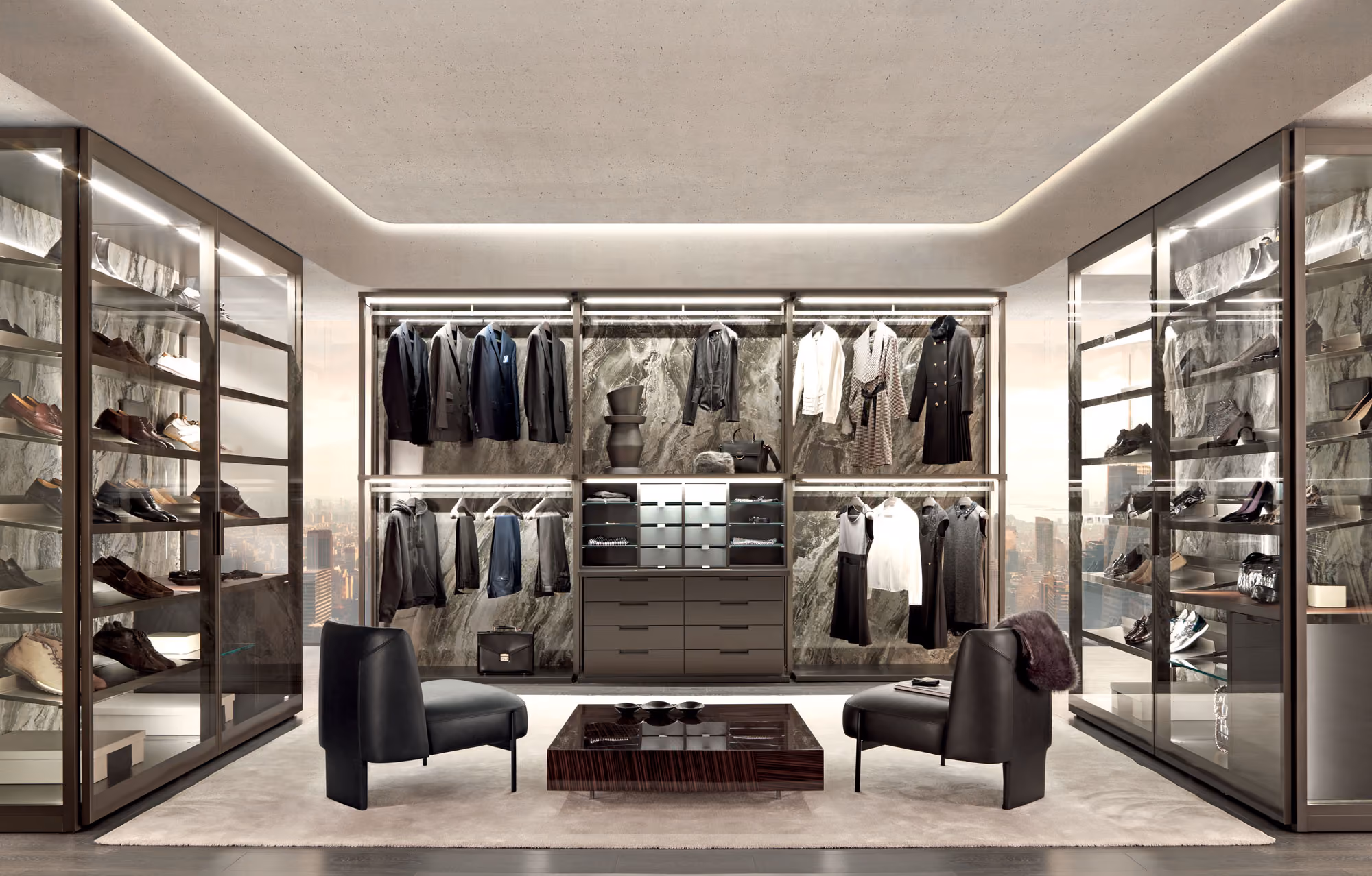 Modern luxury walk-in closet with glass-front shelves filled with shoes, marble-patterned back panel featuring hanging clothes and drawers, two black leather chairs, and a low wooden coffee table on a light rug.