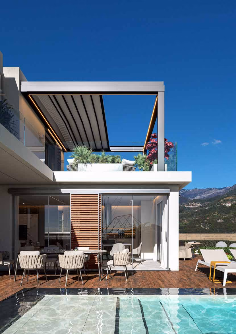 Modern two-story house with a rooftop terrace featuring plants and seating under a pergola, wooden deck with dining table and chairs by a swimming pool, lounge chairs with a small side table, and clear blue sky with mountains in the background.
