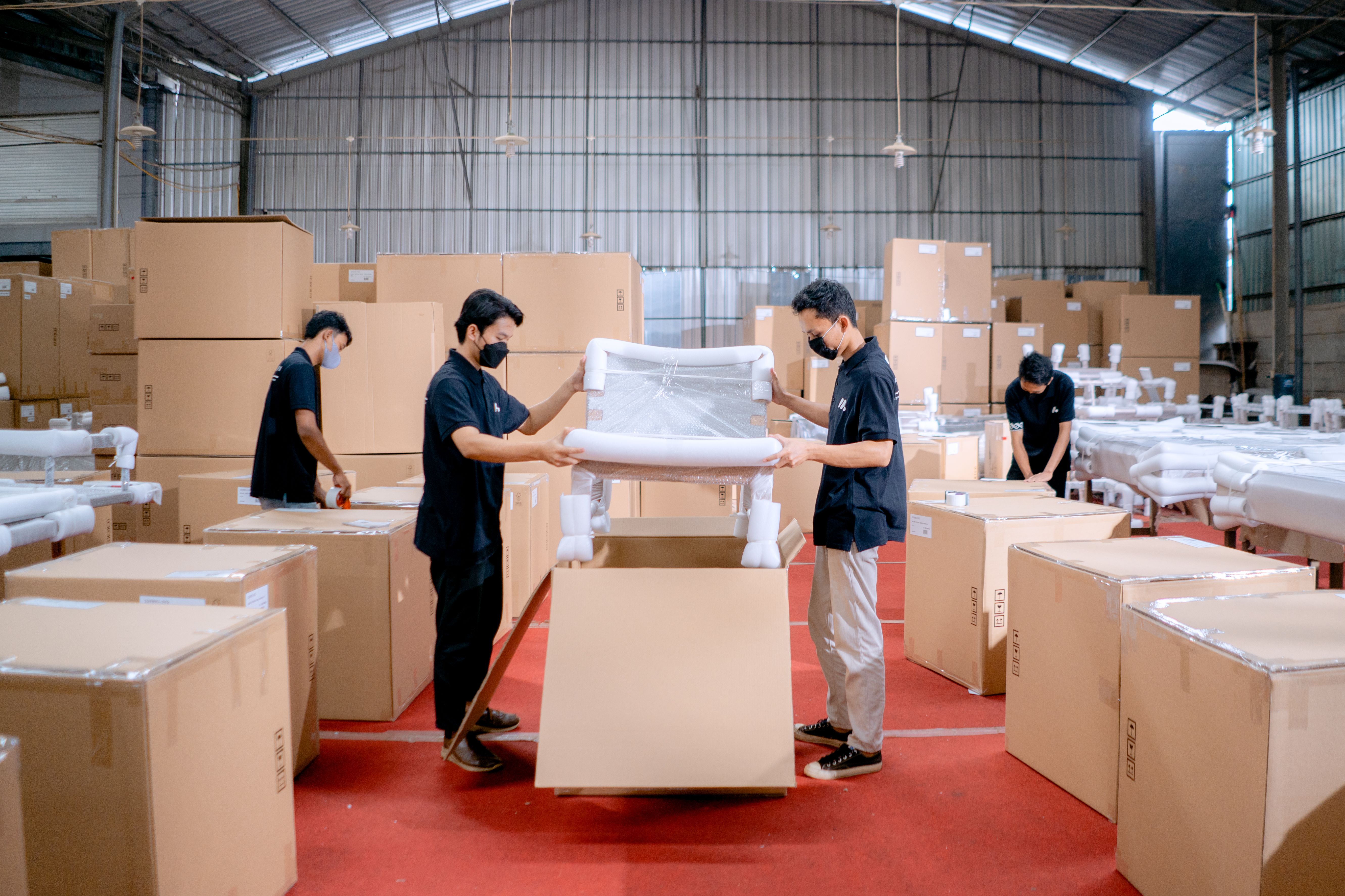 A piece of furniture being assembled by shop floor operators. 