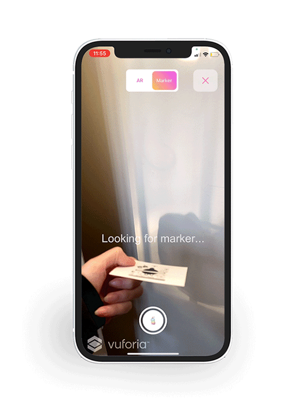 Video of phone camera of a hand holding an augmented reality marker displaying a 3D toy