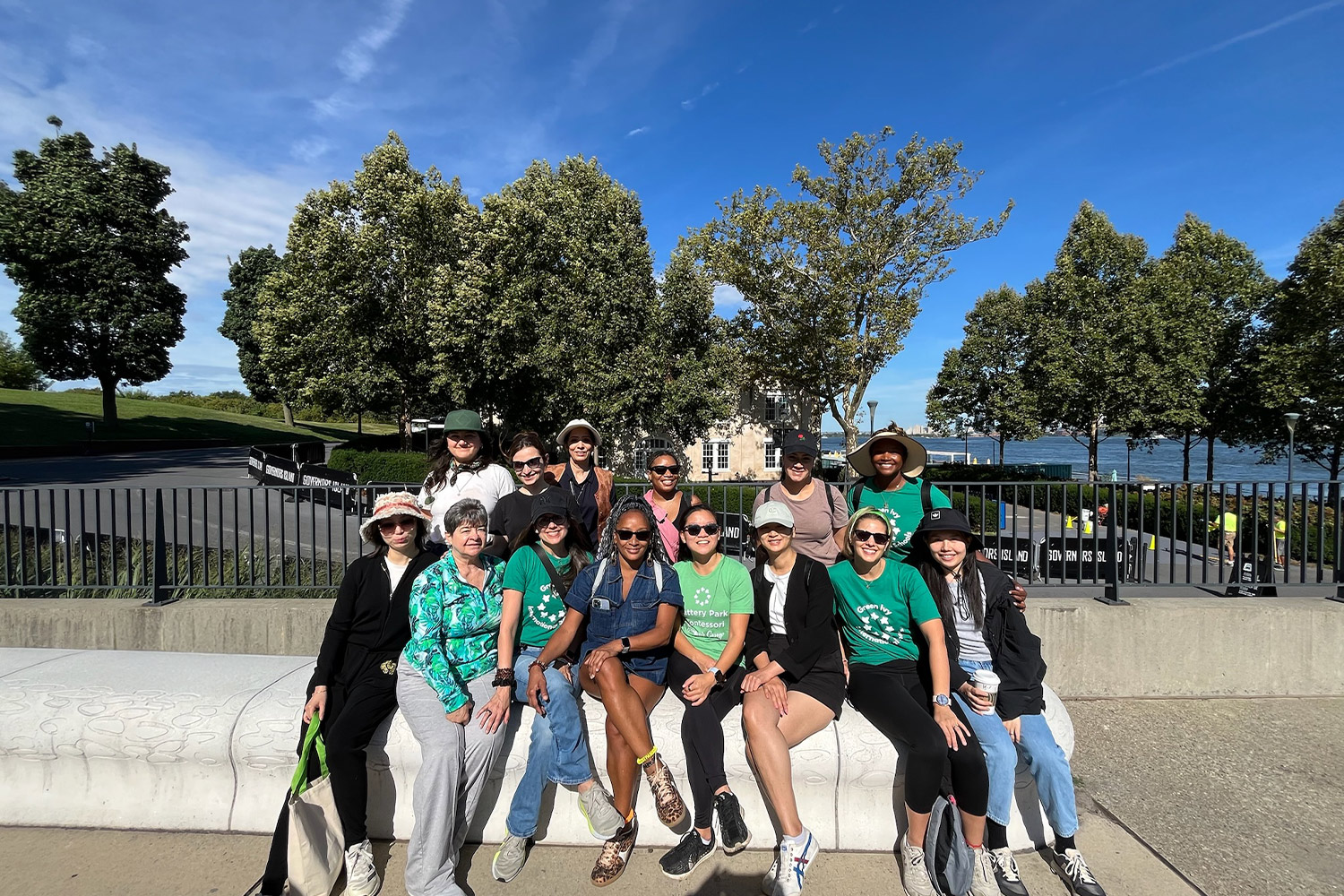 Group of Battery Park Montessori leadership and faculty on a group outing at the park 