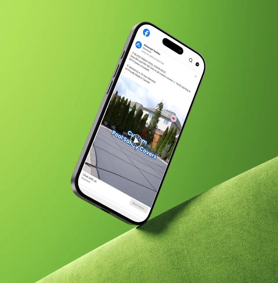 Smartphone displaying a Facebook ad from Advanced Textiles promoting a Black Friday pool cover sale with custom covers starting at $915, featuring a photo of a covered pool in a backyard with tall trees and a house.