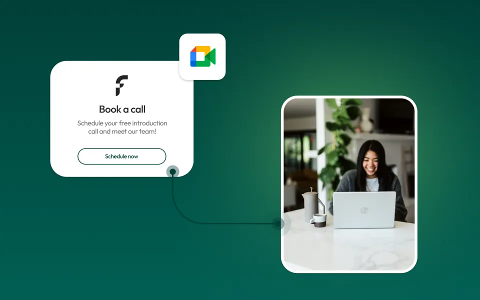 Smiling woman sitting at a white table using a laptop inside a cozy room with plants, alongside a graphic panel prompting to book a free introduction call with a schedule button.