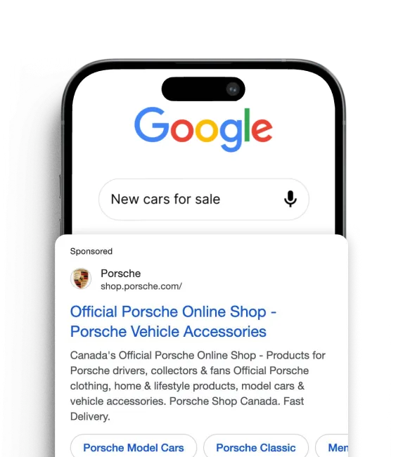 Smartphone screen showing a Google search for 'New cars for sale' with a sponsored ad from Porsche for the Official Porsche Online Shop offering vehicle accessories, clothing, home and lifestyle products, model cars, and fast delivery in Canada.