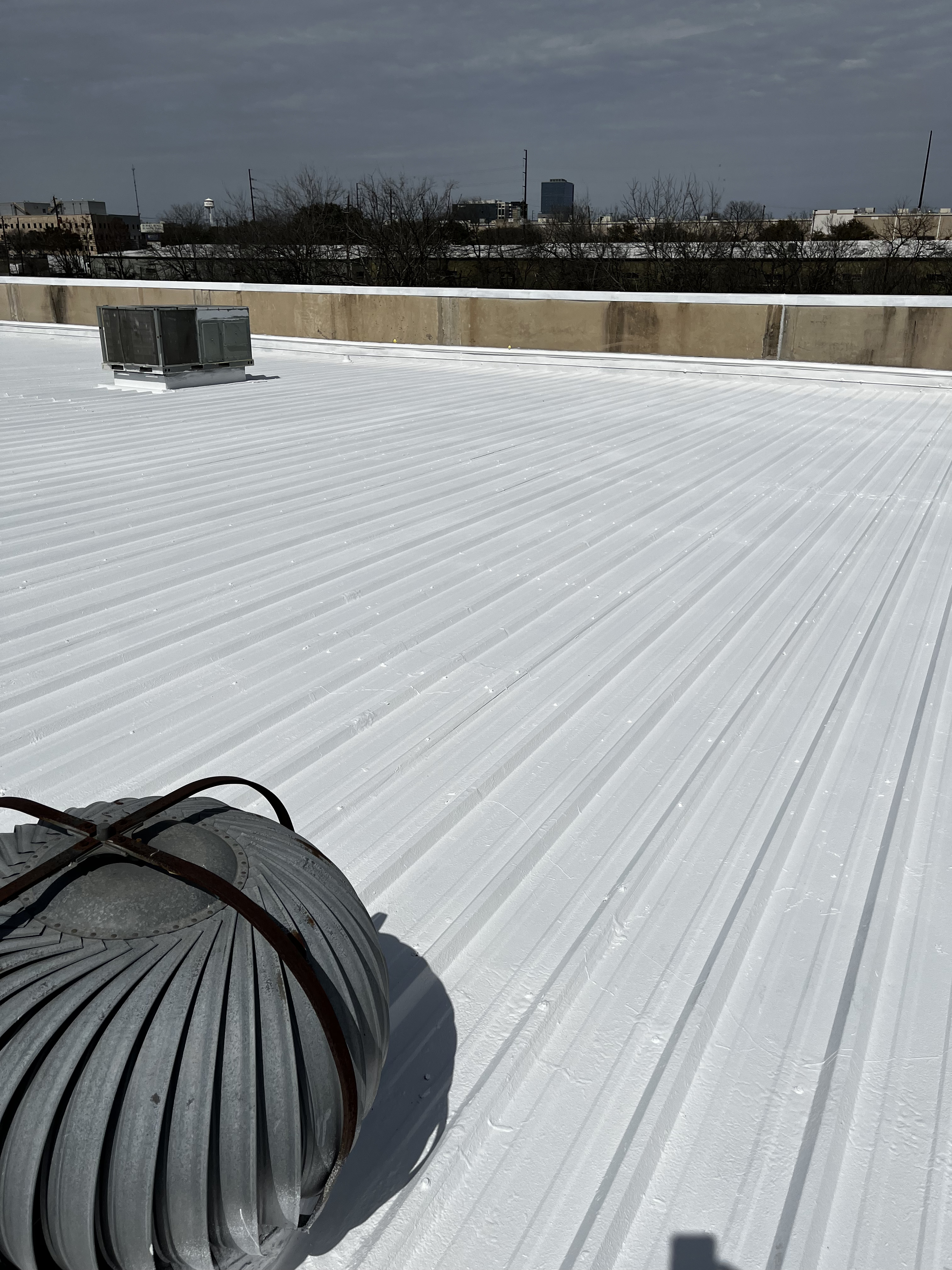 Commercial roof after coating and restoration