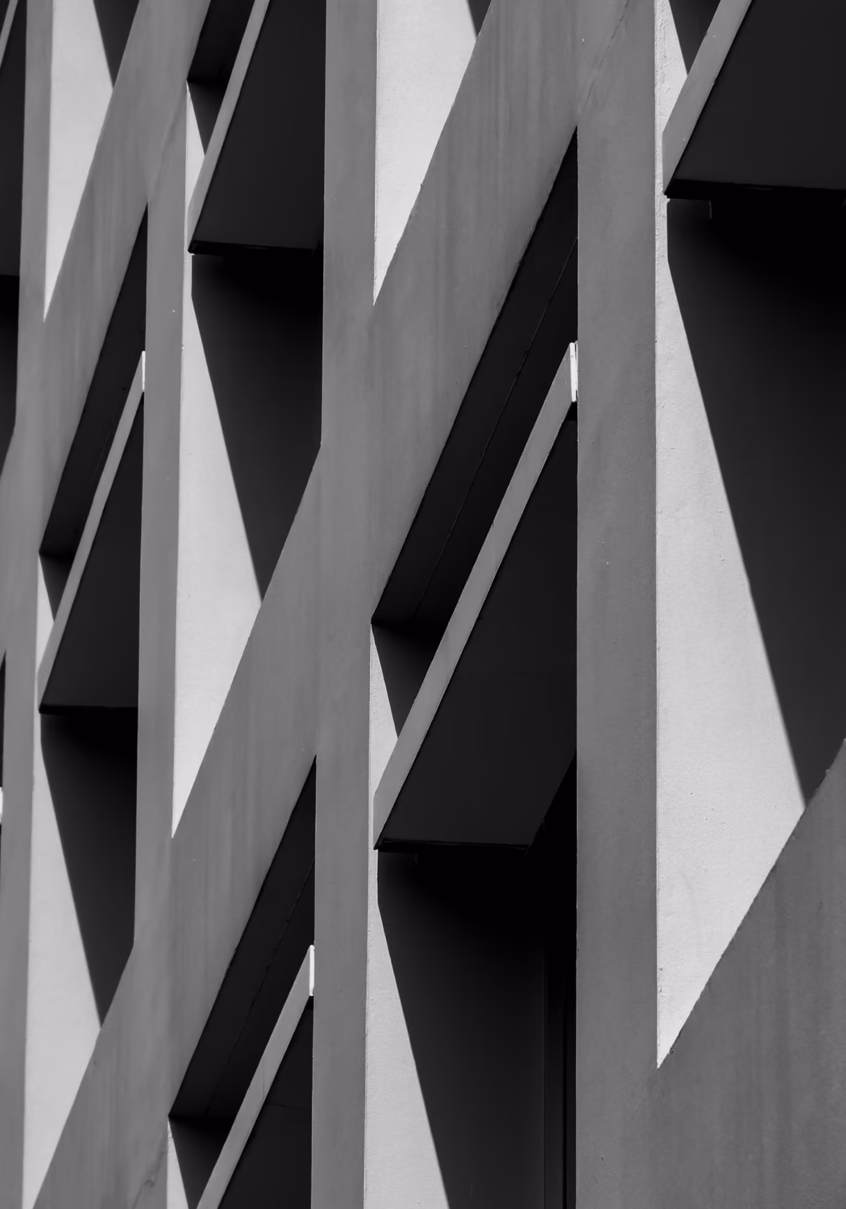 private family office building facade with abstract geometric concrete patterns