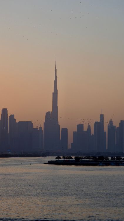 Dubai skyline and Burj Khalifa at sunset