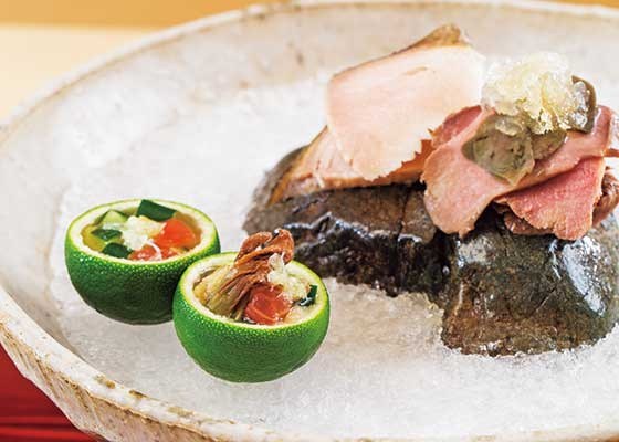 Cured Biwa trout and cold summer boar with filled sudachi citrus shells in a Shinohara preparation documented by Cuisine Kingdom.
