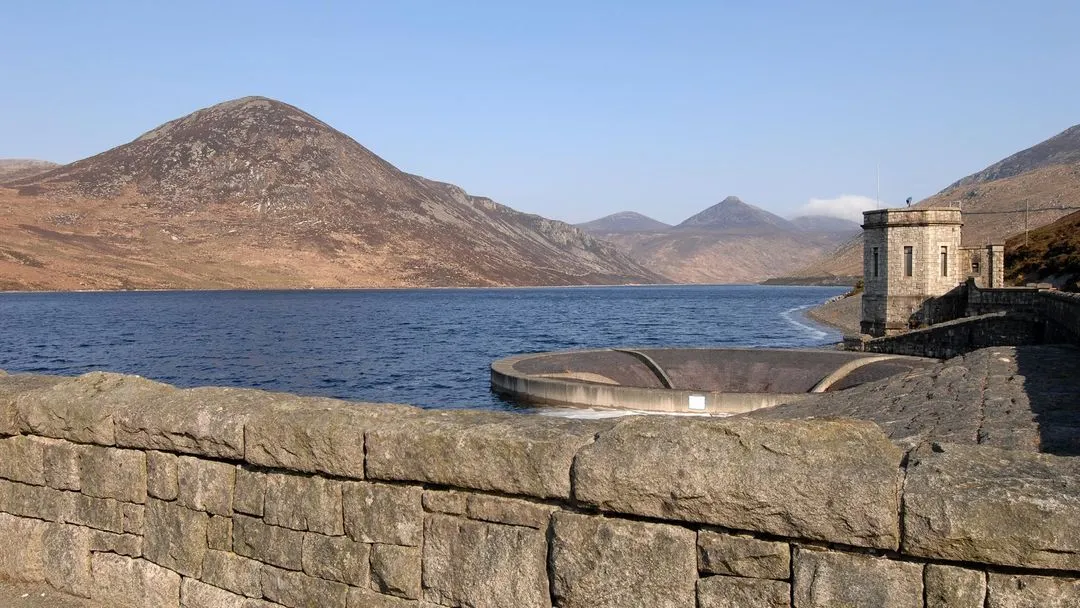Silent Valley Reservoir surrounded by the Mourne Mountains