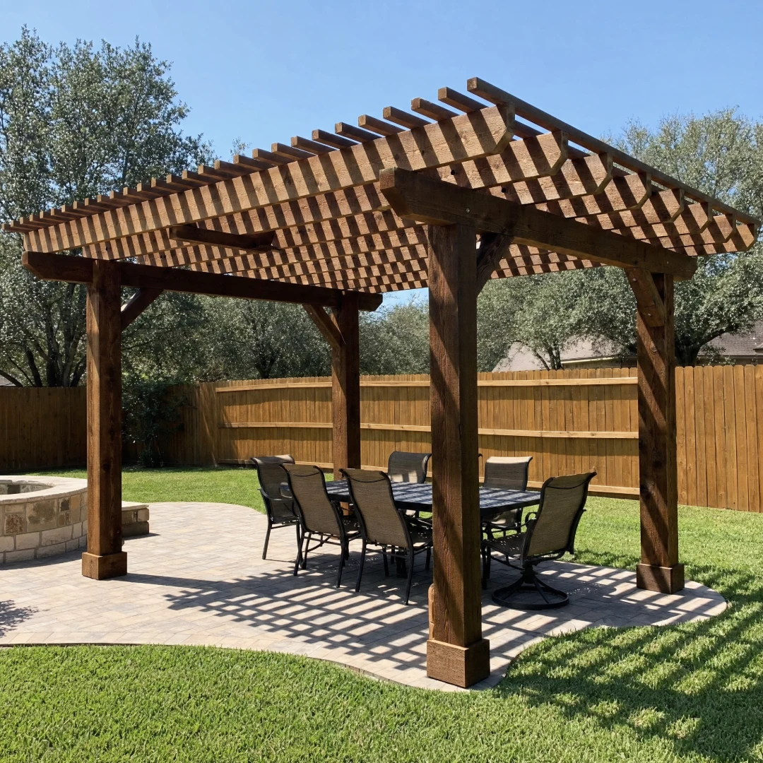 Cedar pergola built over a patio to shade an outdoor seating area