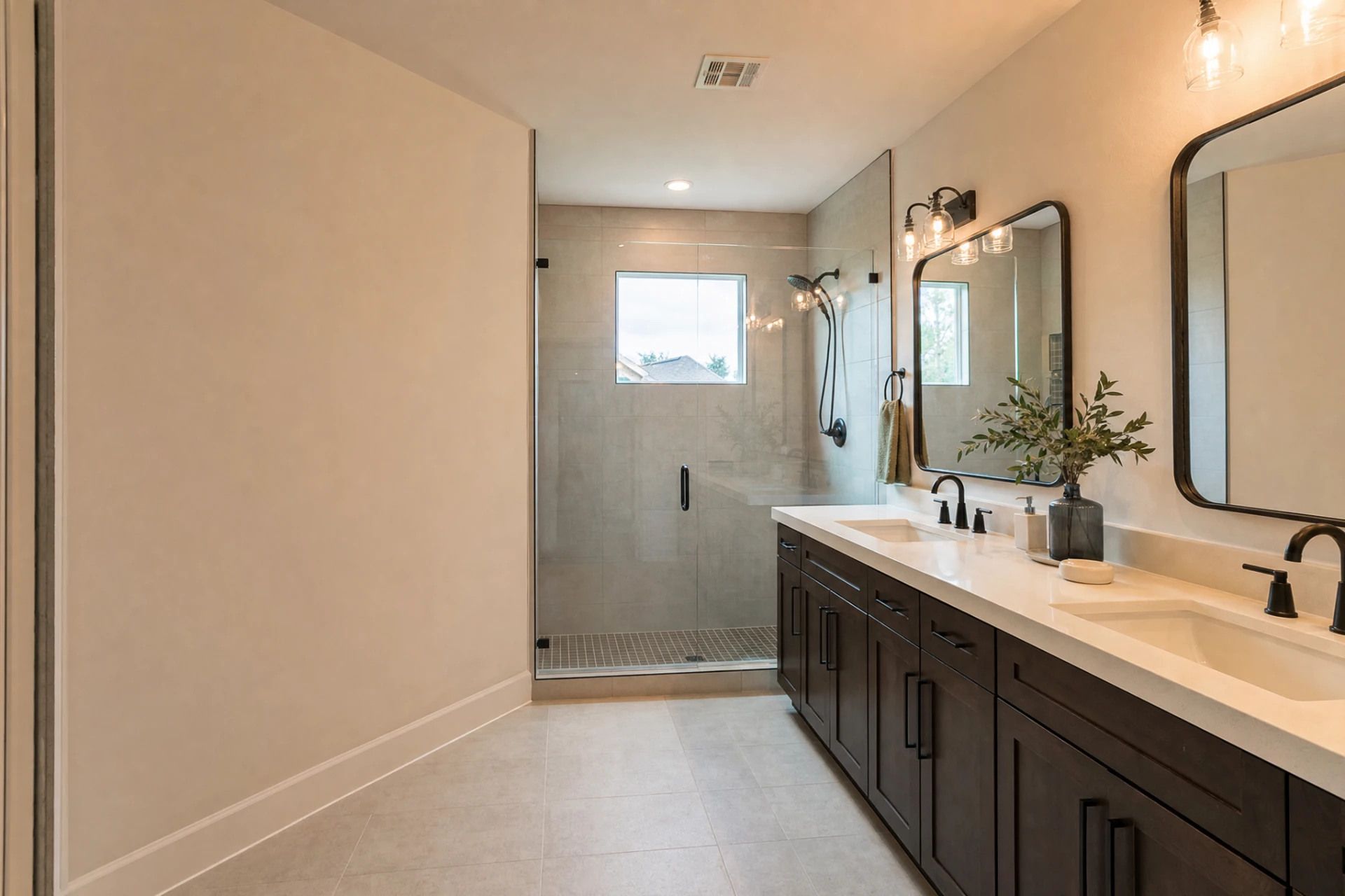 Finished primary bathroom remodel with a double vanity in Cypress, Texas