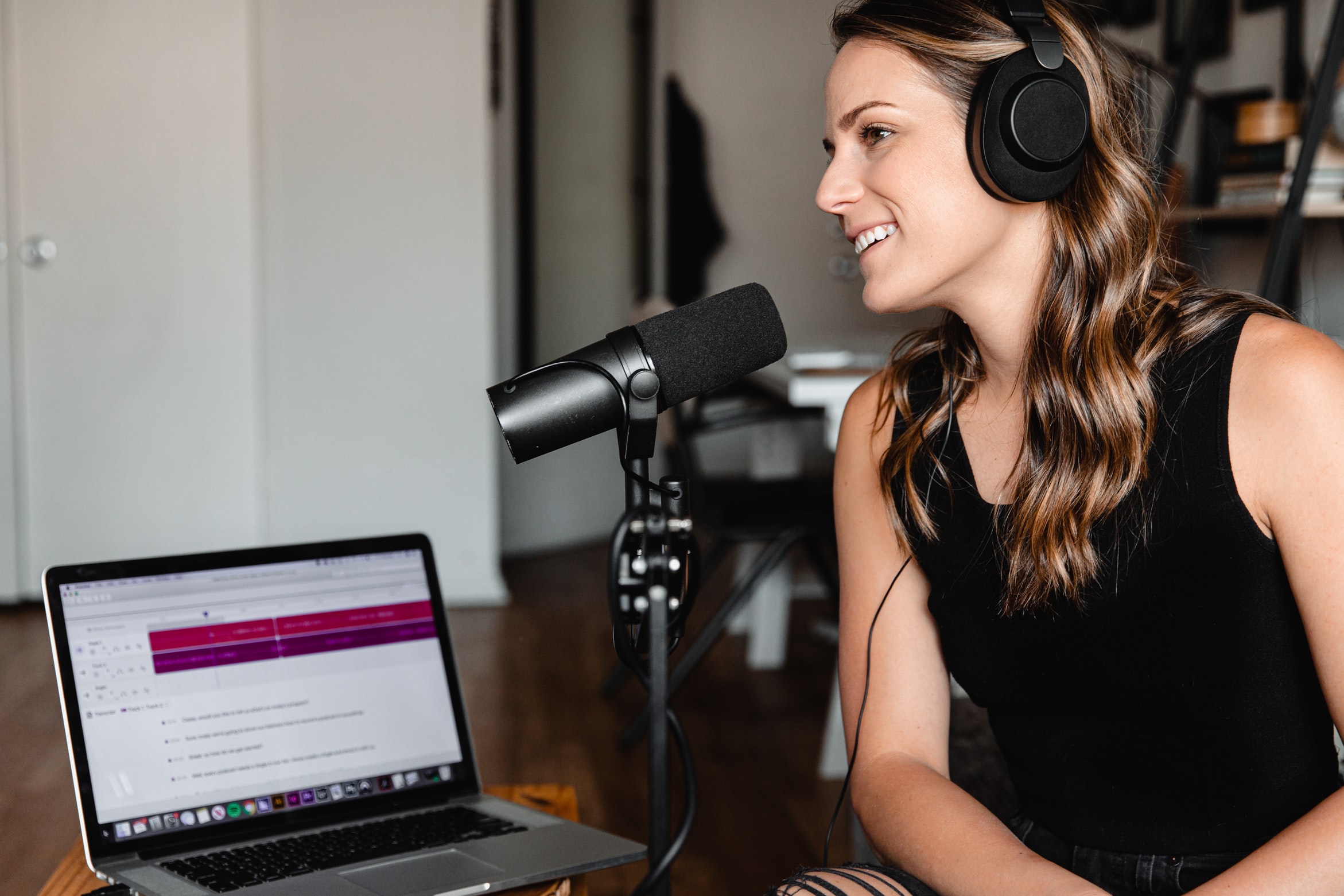 woman recording podcast 
