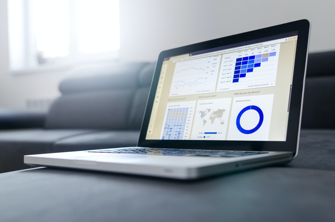 laptop with statistics and graphics