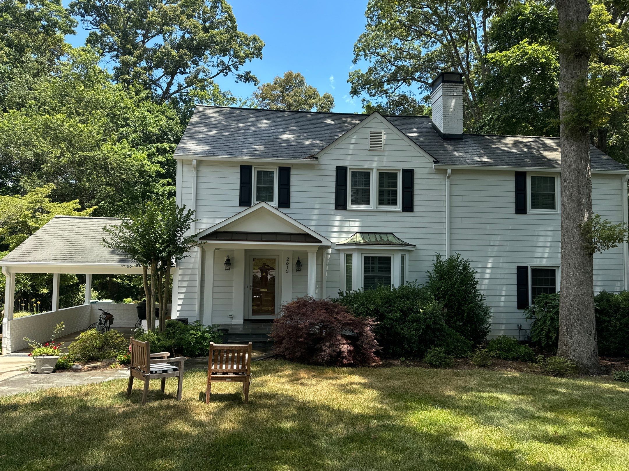 house pressure washing service on vinyl siding and roof in winston salem nc