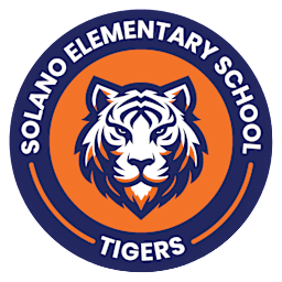 Logo of Solano Elementary School featuring a white tiger head in the center with an orange background, surrounded by a navy blue circle containing the school name and the word Tigers.