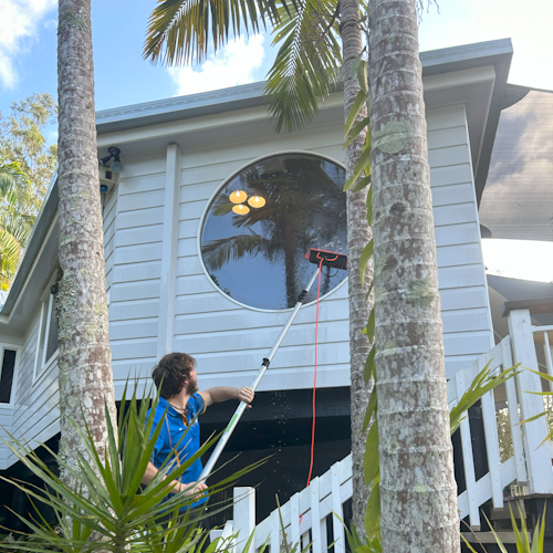 Streak-free window cleaning with a squeegee in Brisbane
