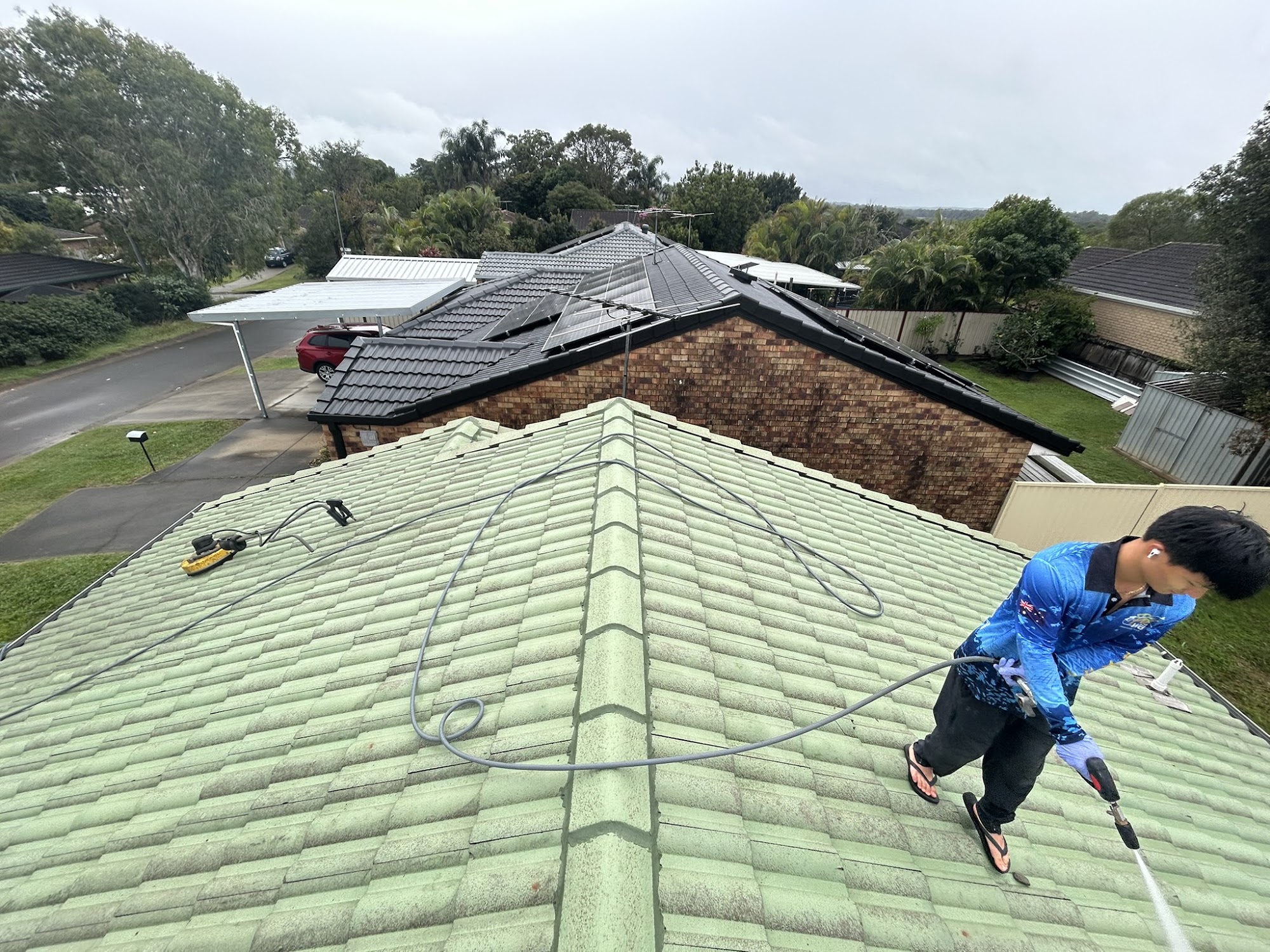 The same concrete tile roof after cleaning