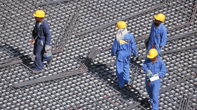 Many blue-collar workers in the UAE and wider region arrive with little to no exposure to formal financial systems. Getty Images
